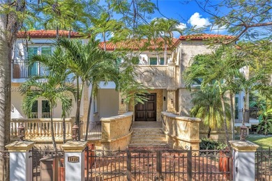 Situated on iconic South Miami Avenue, this exceptional luxury - photo 1