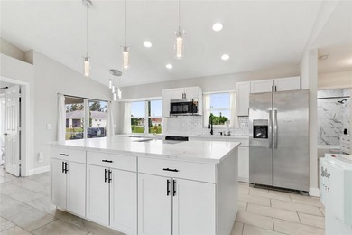 Virtually Staged. Welcome to 12123 Mallorca Ave, a beautifully - photo 18