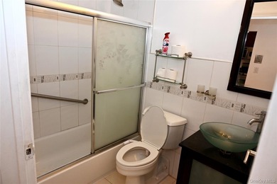 Welcome to Baybridge Condominiums, a prestigious 24-hour gated - photo 26