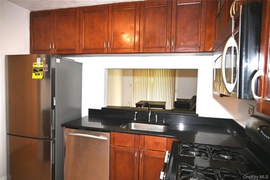 Welcome to Baybridge Condominiums, a prestigious 24-hour gated - photo 32