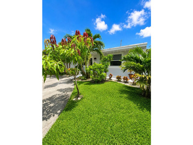 Welcome to this beautifully maintained 4-bedroom, 2-bathroom - photo 6