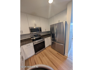Beautiful 2 bedroom 2 1/2 bath condo is located in the desirable - photo 2