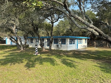 This unique 1-bedroom, 1-bath property sits on .44 acres shaded