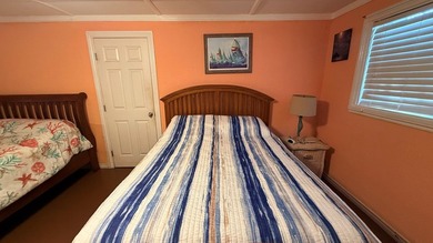 This unique 1-bedroom, 1-bath property sits on .44 acres shaded