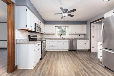 Move-in ready and full of space, this charming brick ranch in - photo 12