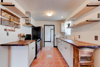 Major price improvement; don't miss this opportunity. 
This - photo 2