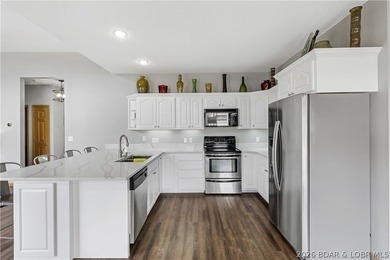 Enjoy the ultimate Lake of the Ozarks lifestyle in this - photo 14