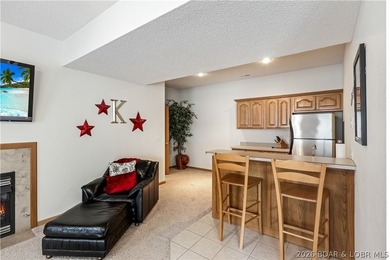 Enjoy the ultimate Lake of the Ozarks lifestyle in this - photo 32