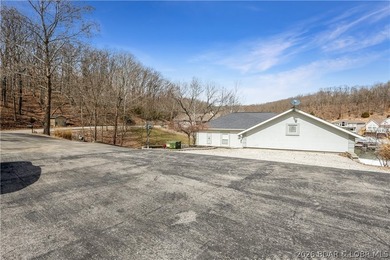 Enjoy the ultimate Lake of the Ozarks lifestyle in this - photo 47