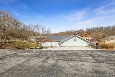 Enjoy the ultimate Lake of the Ozarks lifestyle in this - photo 48