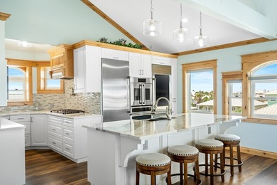 Experience the pinnacle of coastal luxury in this meticulously