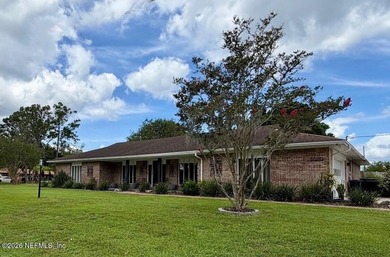 Welcome to 8620 San Servera Drive W, a beautifully updated - photo 2