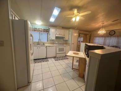 Welcome to this charming 1,248 sq ft home located in the - photo 2