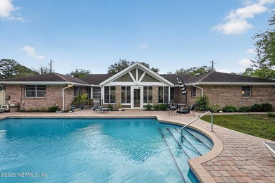 Welcome to 8620 San Servera Drive W, a beautifully updated - photo 3