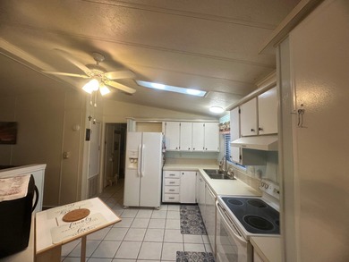 Welcome to this charming 1,248 sq ft home located in the - photo 3