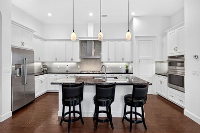 Welcome to luxury living in the prestigious, gated enclave of - photo 5