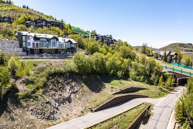 Nestled in the exclusive gated community of Deer Crest, this - photo 13