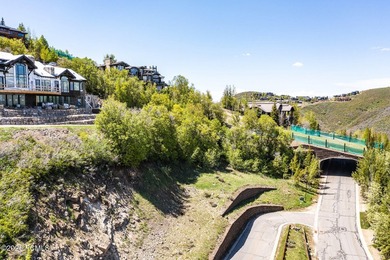 Nestled in the exclusive gated community of Deer Crest, this - photo 14