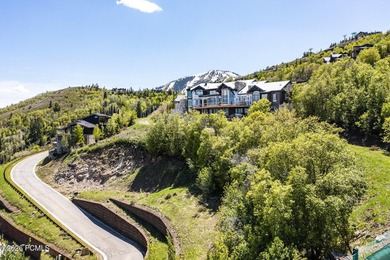 Nestled in the exclusive gated community of Deer Crest, this - photo 15
