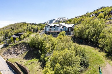 Nestled in the exclusive gated community of Deer Crest, this - photo 16
