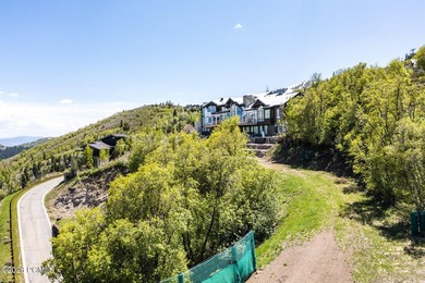 Nestled in the exclusive gated community of Deer Crest, this - photo 18