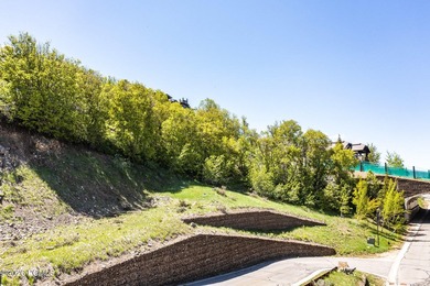 Nestled in the exclusive gated community of Deer Crest, this - photo 19