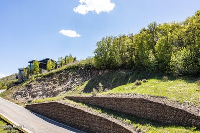Nestled in the exclusive gated community of Deer Crest, this - photo 22
