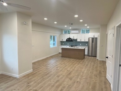 Welcome to your modern coastal retreat! This brand-new - photo 3
