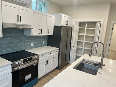 Welcome to your modern coastal retreat! This brand-new - photo 4