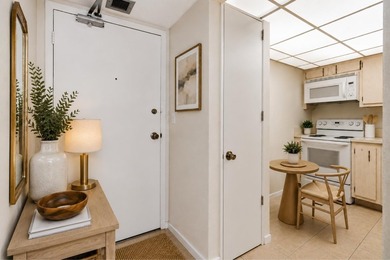 Virtually Staged. Wake up to breathtaking panoramic water views - photo 7
