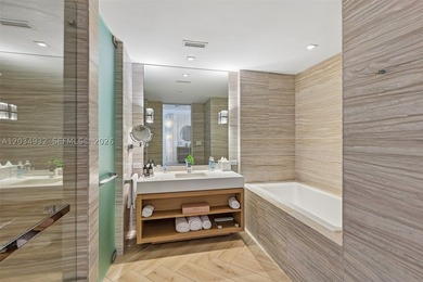 Experience elevated oceanfront living from this beautifully - photo 18