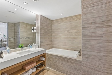 Experience elevated oceanfront living from this beautifully - photo 20