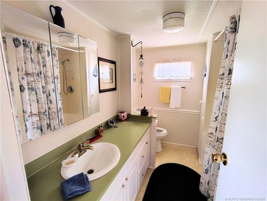Great remodeled 2 bedroom 2 bath home. Pass thru from kitchen to - photo 23