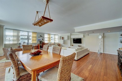 Unique two-story townhome-style residence offering approximately