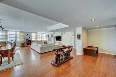 Unique two-story townhome-style residence offering approximately