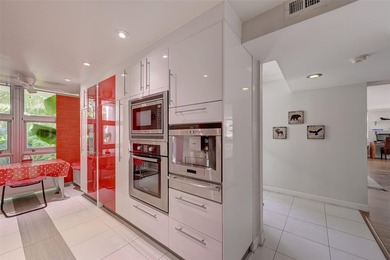 Unique two-story townhome-style residence offering approximately