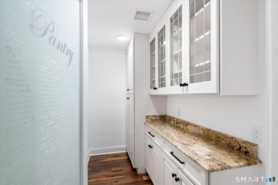 Beautifully updated 4/5 bedroom 4 1/2 bath residence offering a - photo 12