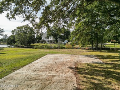 Picture a beautiful waterfront lot on a tranquil bayou, walking - photo 12