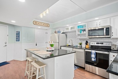 Wake up to sweeping Gulf views in this beautifully renovated - photo 5