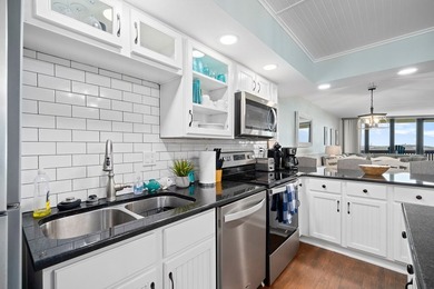 Wake up to sweeping Gulf views in this beautifully renovated - photo 7