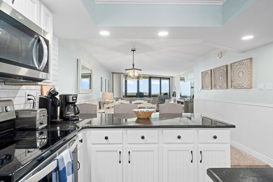 Wake up to sweeping Gulf views in this beautifully renovated - photo 8