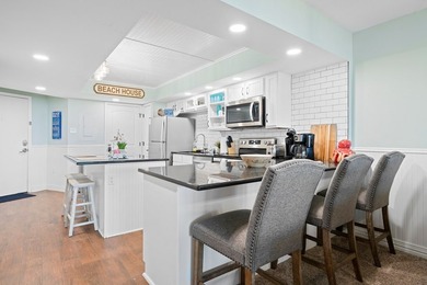 Wake up to sweeping Gulf views in this beautifully renovated - photo 10
