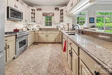 Stunning custom home on 5 private acres with a picturesque pond - photo 11