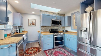 This furnished two-story condo near the Chetco River is move-in - photo 11