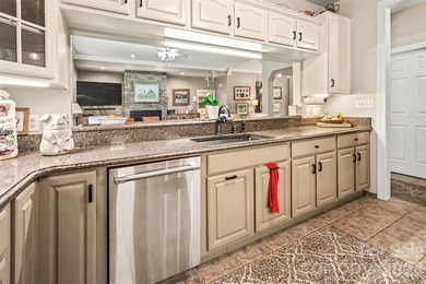 Stunning custom home on 5 private acres with a picturesque pond - photo 12