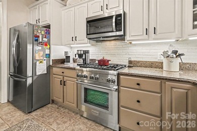 Stunning custom home on 5 private acres with a picturesque pond - photo 13