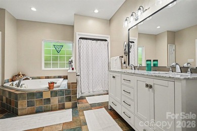 Stunning custom home on 5 private acres with a picturesque pond - photo 23