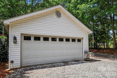 Stunning custom home on 5 private acres with a picturesque pond - photo 25