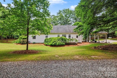 Stunning custom home on 5 private acres with a picturesque pond - photo 27