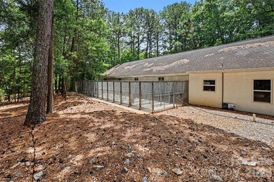 Stunning custom home on 5 private acres with a picturesque pond - photo 29